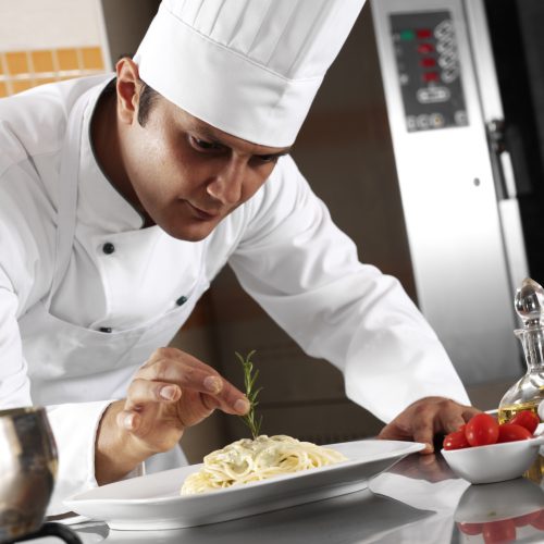 Chef Completing Pasta